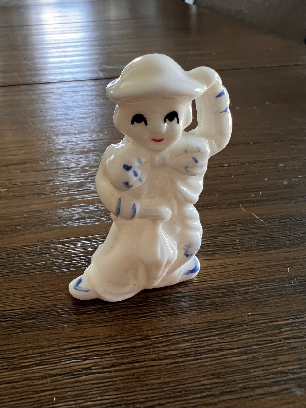 Vintage White Ceramic Clown Figurine with Blue Accents